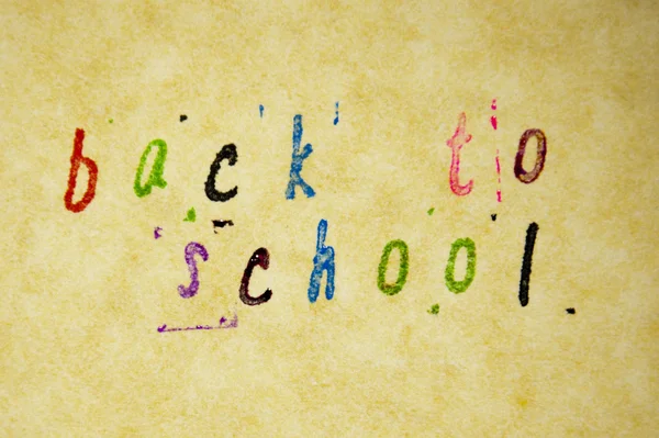 Back to school written with pen on parchment — Stock Photo, Image