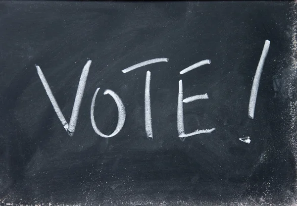 Vote title written with chalk on blackboard — Stock Photo, Image