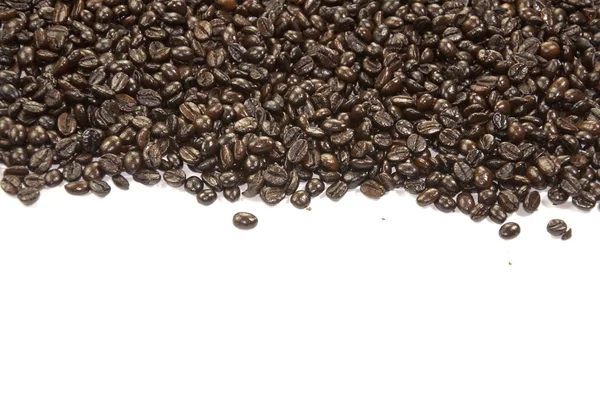 Ziarna kawy i białe tło — Zdjęcie stockowe