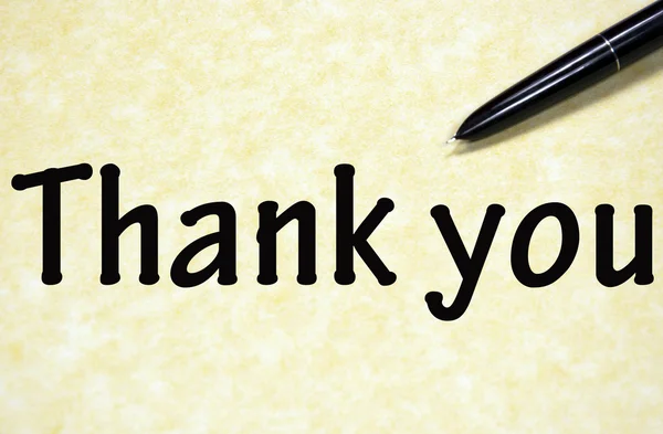 Thank you title written with pen on paper — Stock Photo, Image