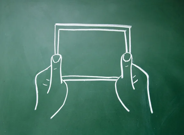 Resumen manos sosteniendo un símbolo de computadora tablet — Stockfoto
