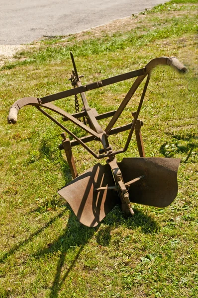 Antique agriculture machine plough — Stock Photo, Image