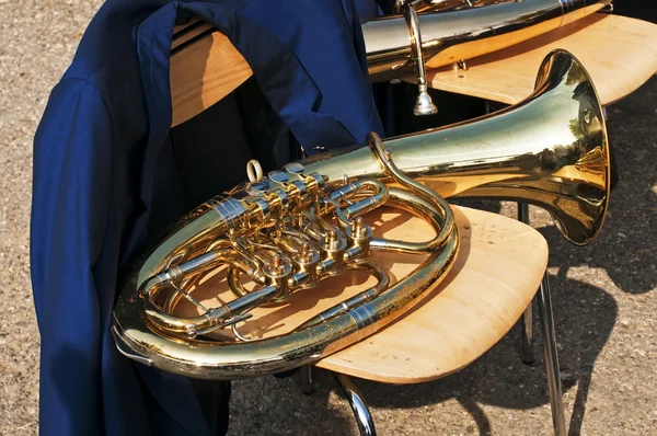 Tuba on chair — Stock Photo, Image