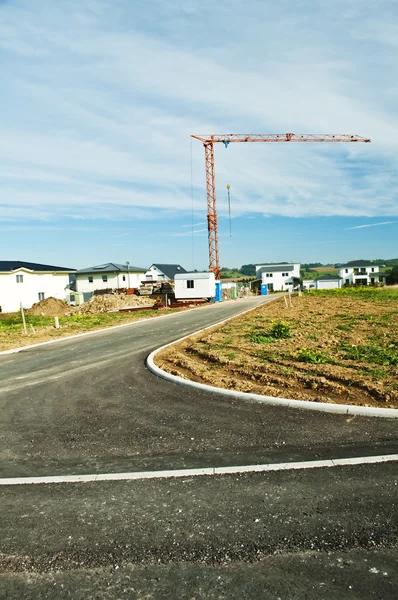 Casas propriedade com guindaste — Fotografia de Stock