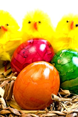 easter basket with painted eggs and biddies clipart