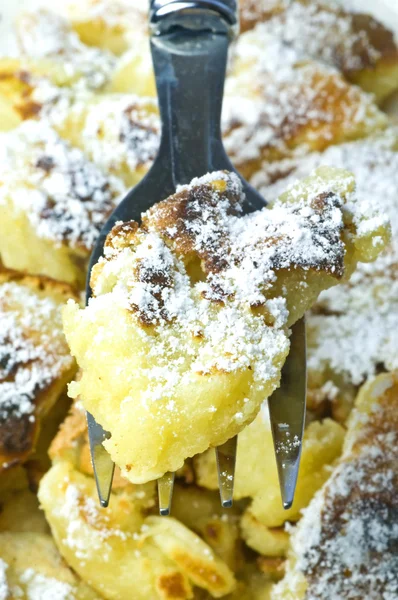 Austrian deli cut-up and sugared pancake with raisins — Stock Fotó