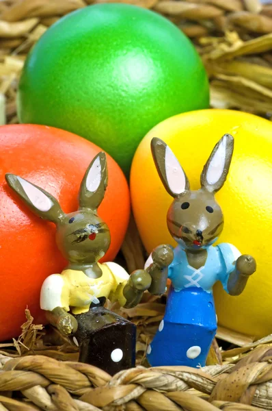 Easter basket with painted eggs and bunnies — Stock Photo, Image