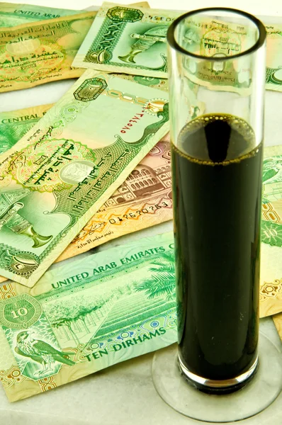 Oil and money — Stok fotoğraf