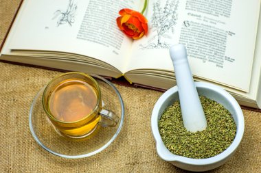 Rockrose tea with medieval textbook clipart