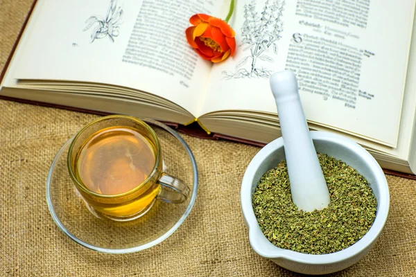 Té Rockrose con libro de texto medieval —  Fotos de Stock