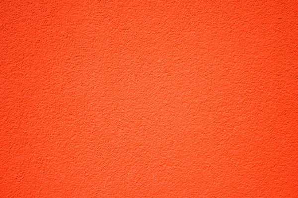 Betonwand mit roter Beschichtung — Stockfoto
