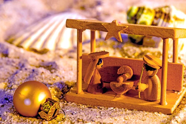 Nativity scene on a beach — Stock Photo, Image