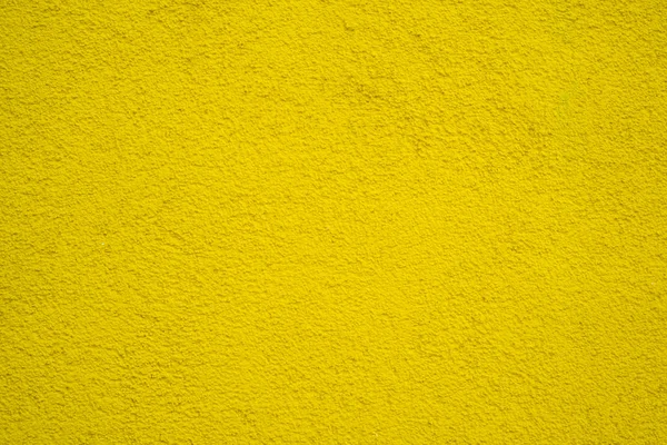 Wall of concrete with yellow coating — Stock Photo, Image