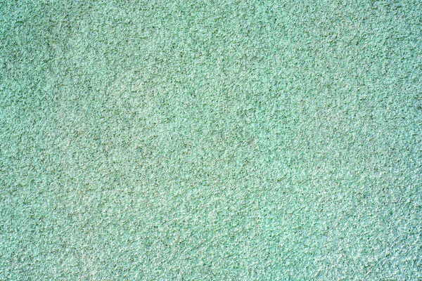 Wall of concrete with green coating — Stock Photo, Image
