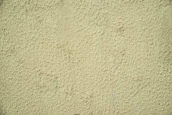 Wall of concrete with spoiled coating — Stock Photo, Image