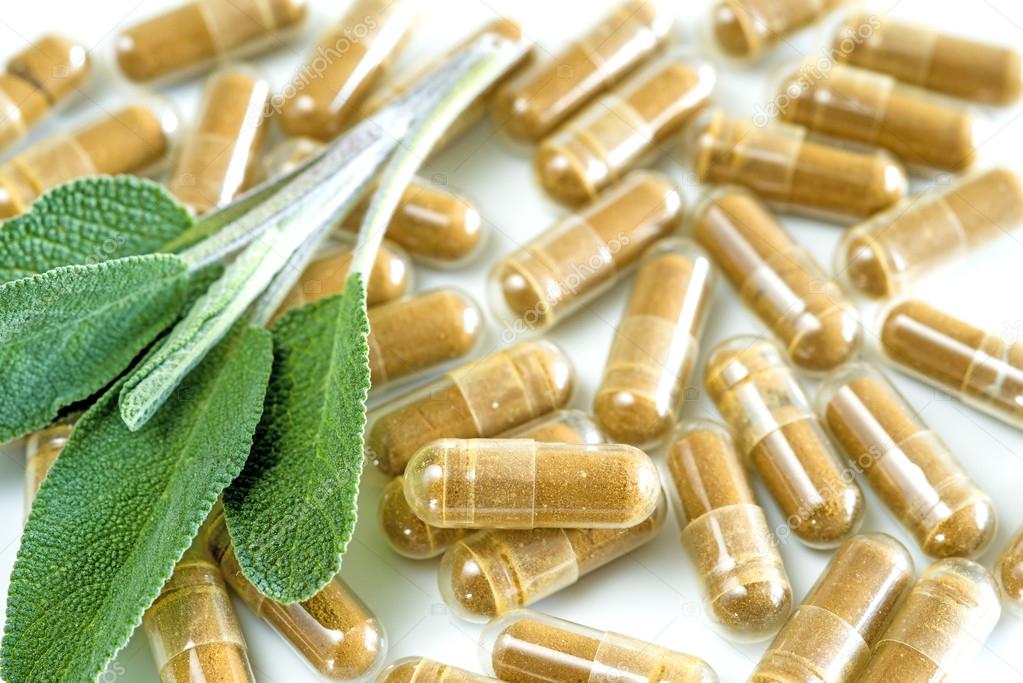 Sage leaves with herbal pills — Stock Photo © jochenschneider 44369697
