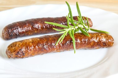 Merguez, North-African sausage, roasted clipart