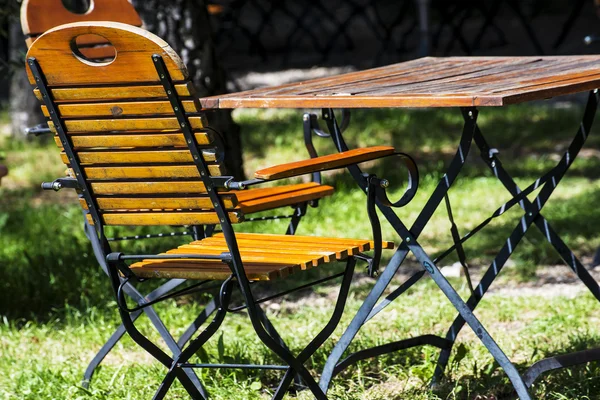 German beer garden with wooden furniture — Stock Photo, Image