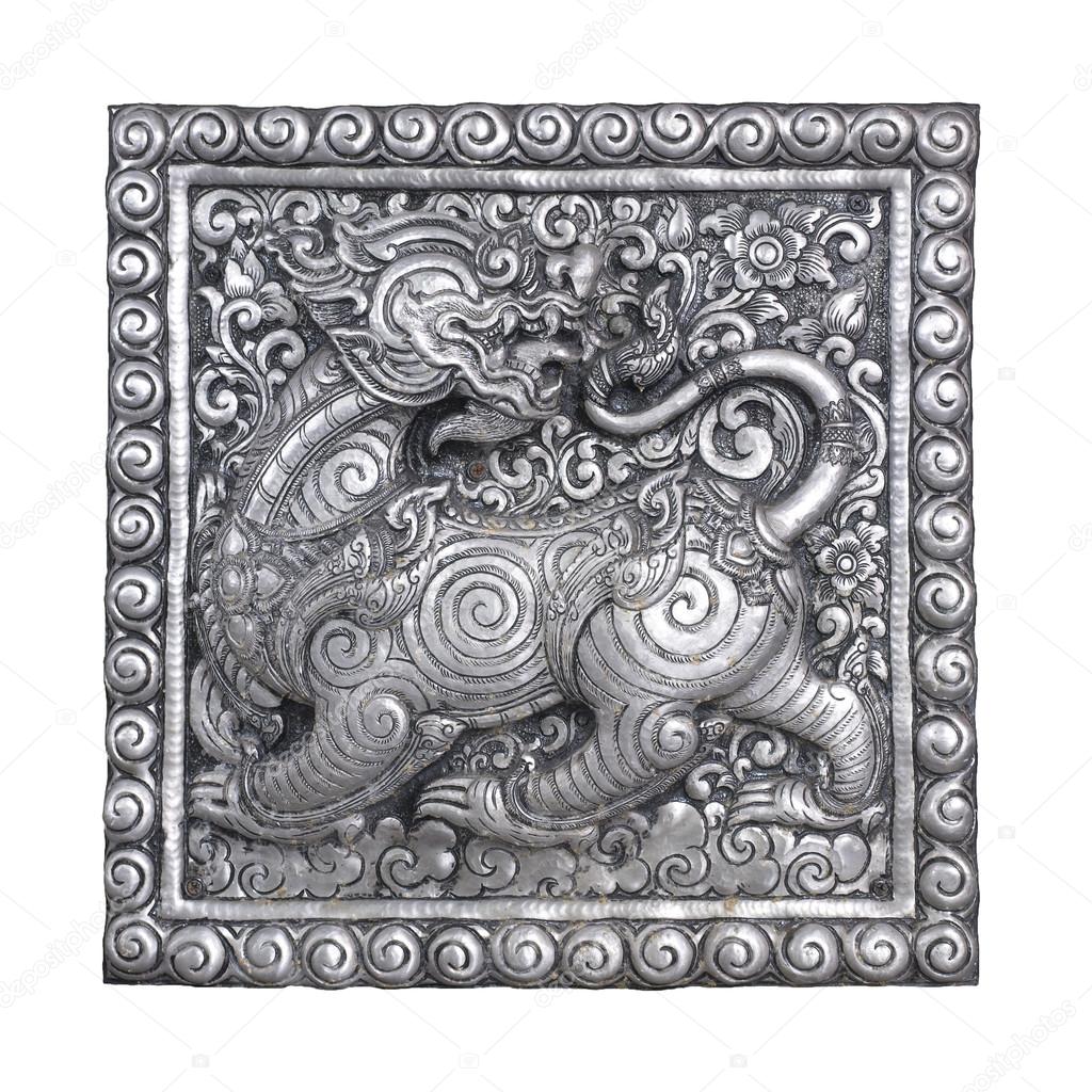Silver lion and silver frame handmade in a Thai temple.