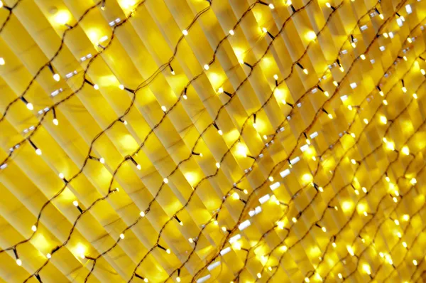 Texture yellow lamps garlands — Stock Photo, Image