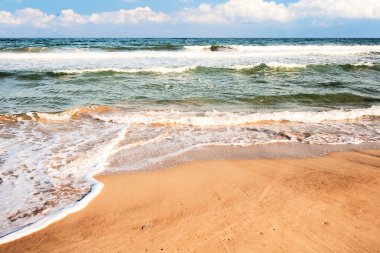 plaj kum, deniz ve dalgalar ile bir parçası