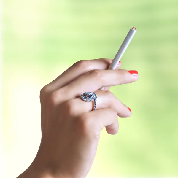 Hand with cigarette — Stock Photo, Image