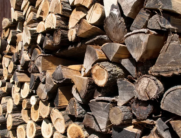 Background of dry chopped firewood logs — Stock Photo, Image