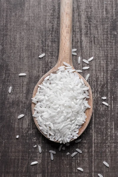 Rice With Wooden Spoon. — Stockfoto