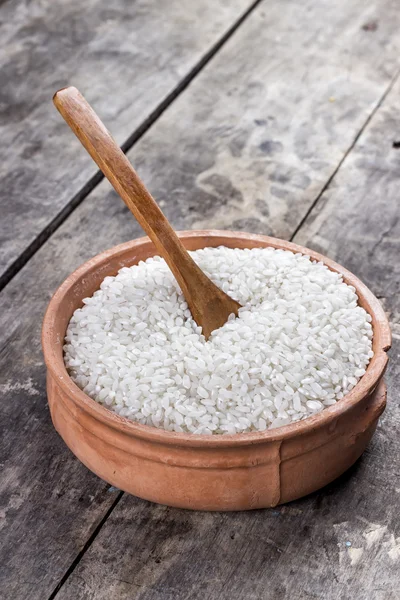 Rice on wooden spoon — Stock Photo, Image