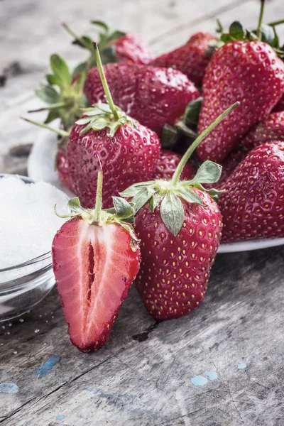 Strawberries and sugar — Stock Photo, Image