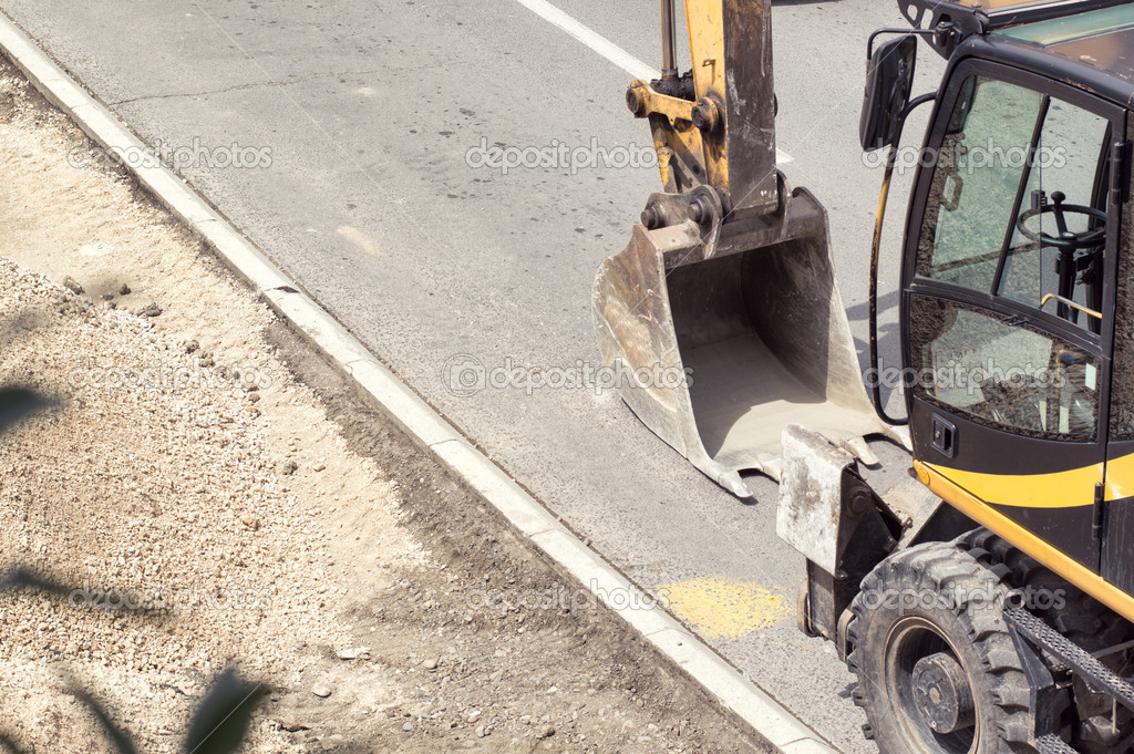 Scoop on a road Stock Photo by ©librakv 26413843