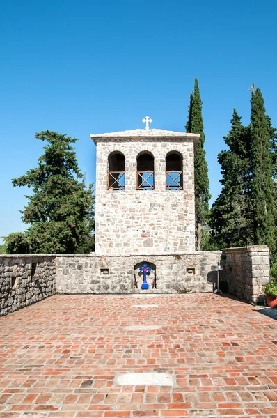 Churchyard and bell tower — Stock Photo, Image