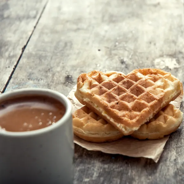 Heart shaped waffles and coffee — Stock Photo, Image