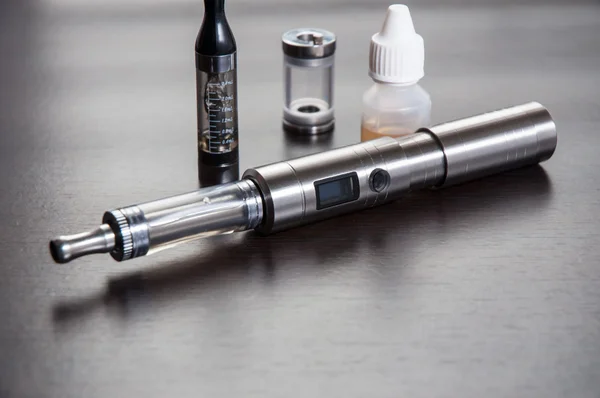 E-cigarette on table — Stock Photo, Image