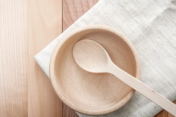 Wooden bowl and spoon — Stock Photo, Image