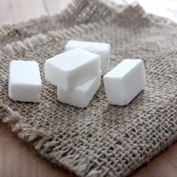 Sugar cubes on table — Stock Photo, Image