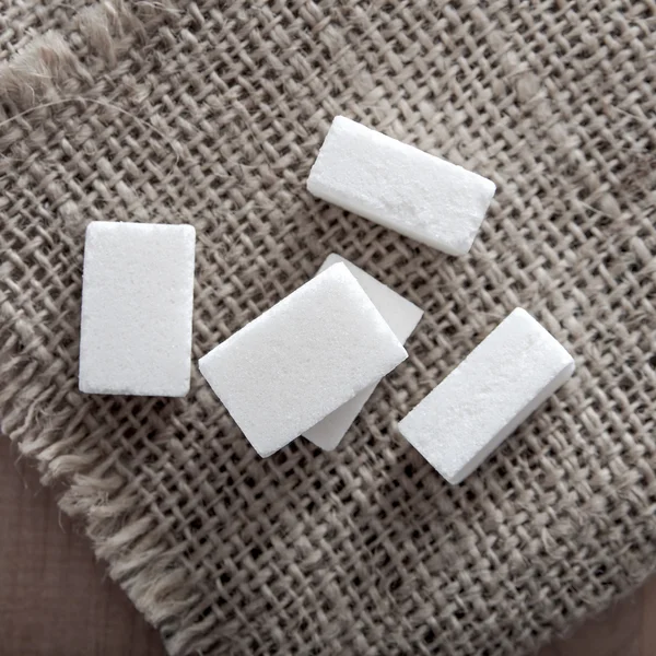 Sugar cubes on table — Stock Photo, Image