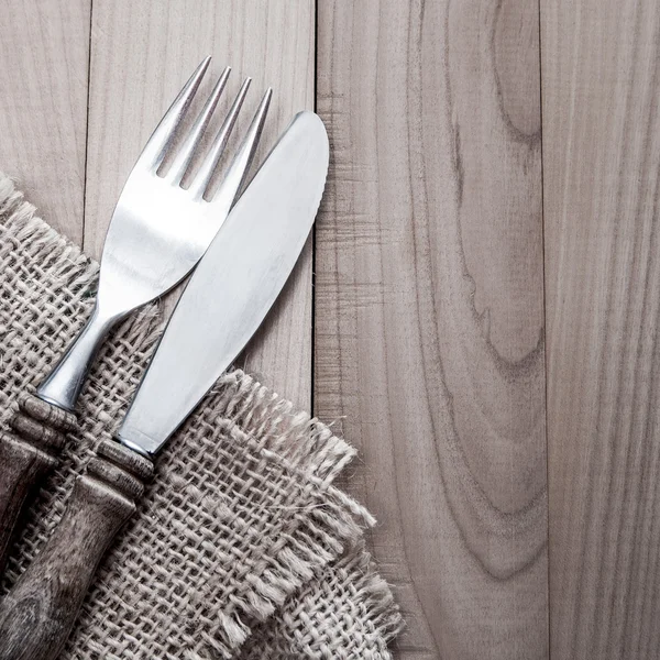 Vintage silverware on wooden background — Stock Photo, Image