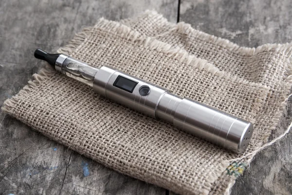 E-cigarette on table — Stock Photo, Image