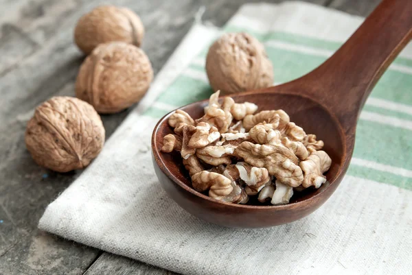 Walnuts on wooden background — Stock Photo, Image