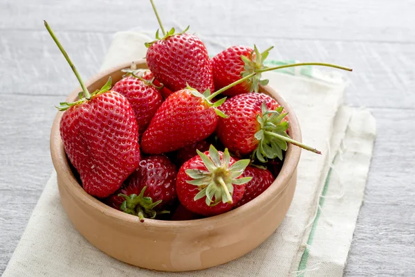 Strawberries on a wooden table — Stock Photo, Image