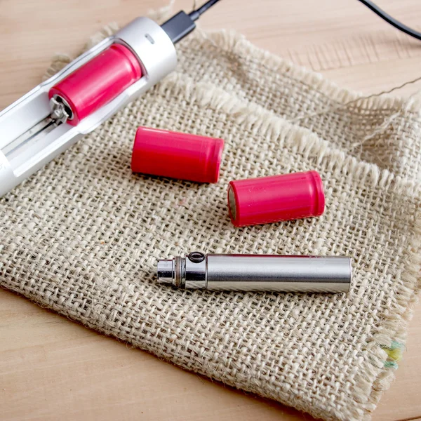 Batteries and Charger for e cigarette — Stock Photo, Image