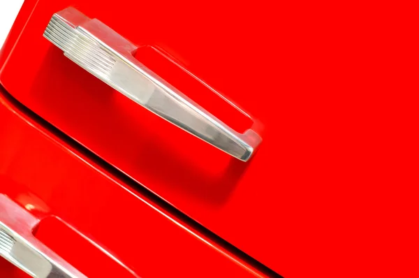 50 代赤冷蔵庫ドアのクローズ アップ ロイヤリティフリーのストック写真
