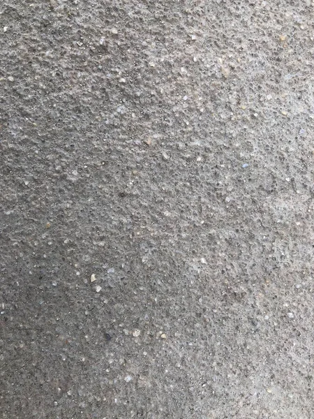 Asfalt dokusu yakın çekim. Gri renkli kirli asfalt arkaplan.