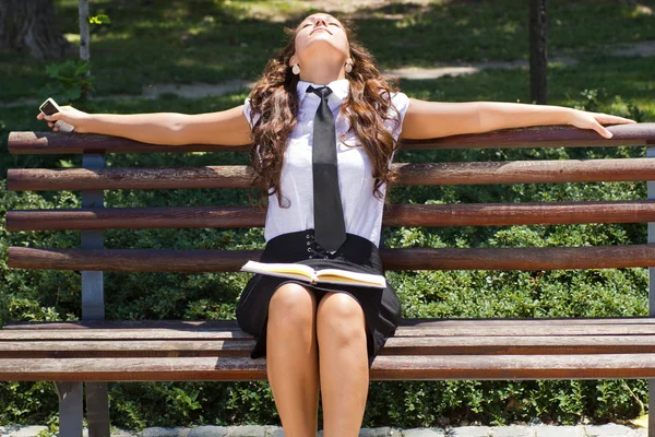 Businesswoman in park on break — Stock Photo, Image