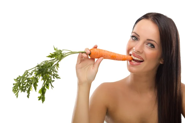 Mujer con zanahoria fresca — Foto de Stock