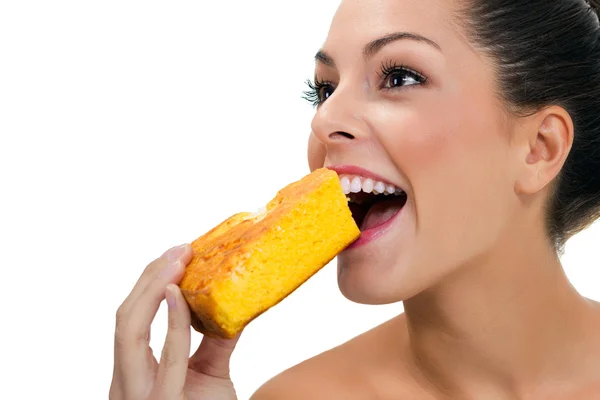 Woman eating a macrobiotic pie — Stock Photo, Image