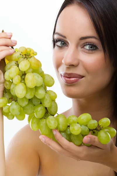 Young woman and fresh grapes — Stock Photo, Image