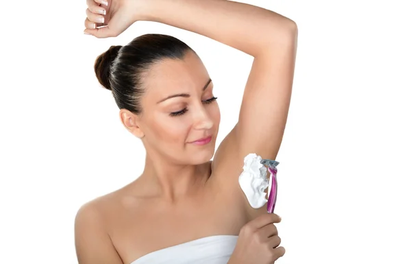 Woman shaving armpits — Stock Photo, Image