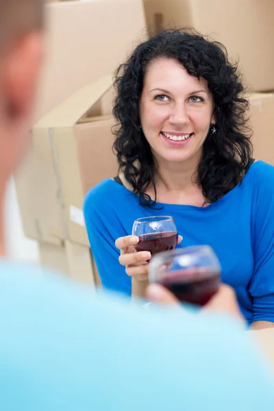 Couple toasting in the new house — Stock Photo, Image